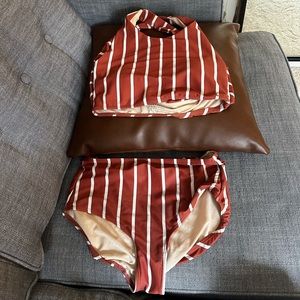 Albion Fit striped swim suit